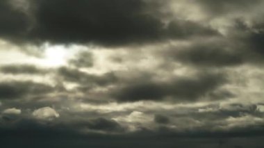 Cinematic 8K 7680x4320.Sky covered with gray and depressing gloomy storm clouds.Cloud cover also known as cloudiness cloudage amount refers to the fraction of the sky obscured by clouds when observed from a particular location.