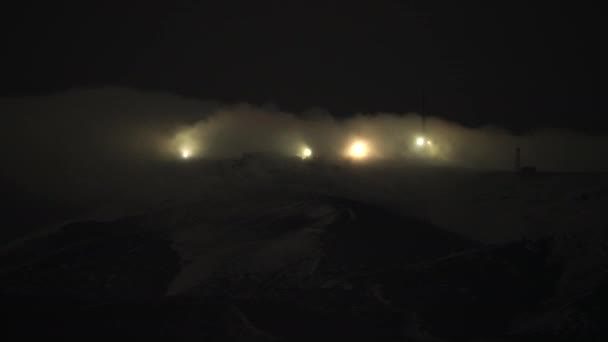 4320P 7680X4320 Night Lights Antennas Top Snowy Mountain Fog Clouds — Stock video