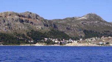 Yunanistan 'ın Megisti adasından 4K.Kastellorizo Castellorizo Doğu Akdeniz' de Yunan adası ve Dodecanese belediyesi. Yunanistan 'ın Yunan adalarında Rodos bayrağı. Yunan Cumhuriyetinin Vegetasyonu. Güneydoğu Avrupa, Ege Denizi
