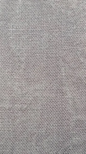 Háttér vászonvászon mintával. Grey Hessian vászon textúra hasznos, mint egy háttér. — Stock Fotó