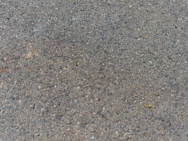 Çatlakları ve çizikleri olan beton bir duvarın dokusu arka plan olarak kullanılabilir.