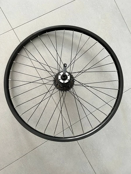 MTB wheel on a floor. Mountain bike aluminum double-wall rim disc.