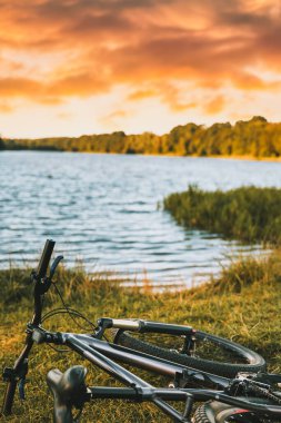 Bicycle on the shore of the lake. concept of travel and outdoor activities at the summer.