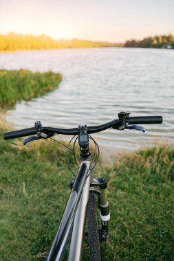 Bicycle on the shore of the lake. concept of travel and outdoor activities at the summer.