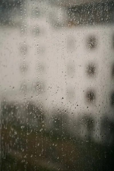 Rain Droplets Window Glass View Window Blurred Street Buildings Bad —  Fotos de Stock