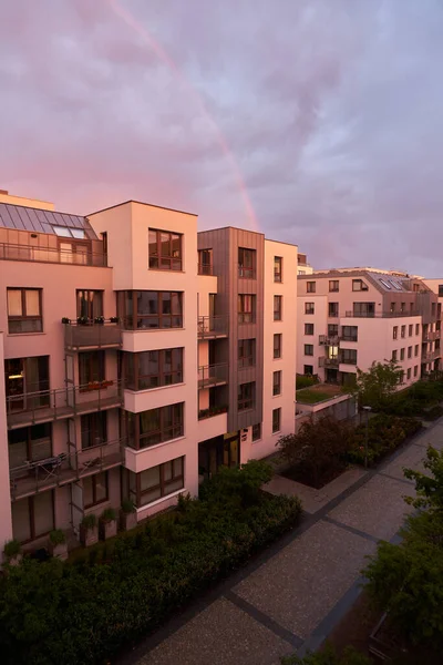 Contemporary resident complex in Europe during summer evening. Concept of happy living in the modern house. Owning a real estate concept.