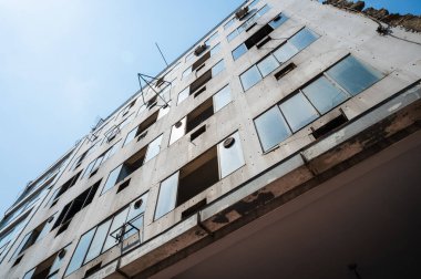 ATHENS, GREECE - MAY 14, 2022: Abandoned building on Agiou Konstantinou Street in Athens, Greece