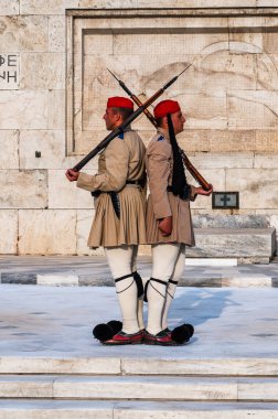 ATHENS, GREECE - MAY 14, 2022: A marching soldier from the presidential guard Evzones in front of The Tomb of the Unknown soldier in Athens, Greece.