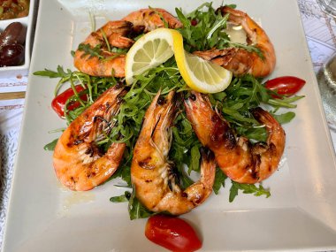 prawns fried shrimp spices delicious vegetarian portion on the table for healthy meal snack outdoor top view copy space for text food background rustic image pescetarian. Close-up.