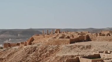 City fortress Avdat, Israel - April 11, 2022: View of the ruined buildings in the ancient Nabataean city of Avdat, now a national Park, in the Negev Desert, Southern Israel