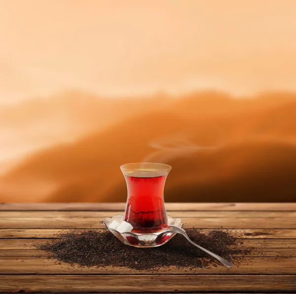 Turkish tea and enjoy the sunset (clipping path) — Stock Photo, Image