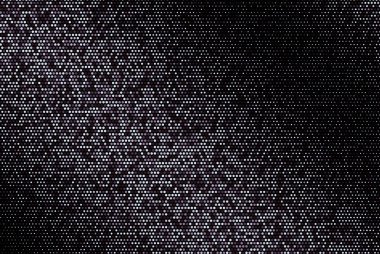 Halftone abstract black background of light and lilac brown dots confetti
