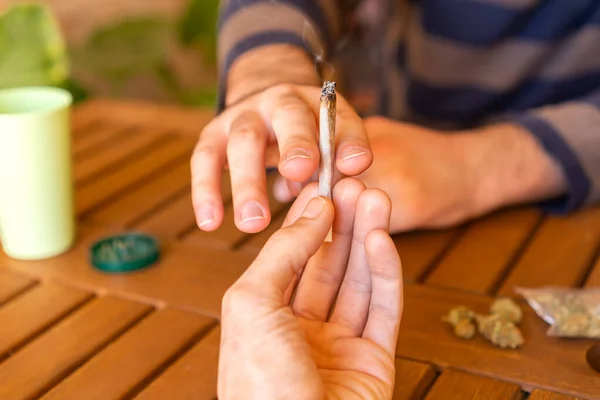 People Sitting Table Party Sharing Cannabis Joint — Stock Photo, Image