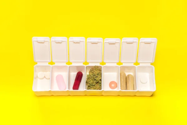 White Pillbox Big Cannabis Bud Different Colorful Pills Yellow Background — Stock Photo, Image