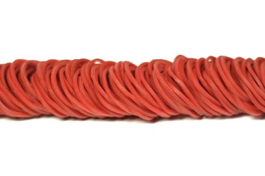 red rubber band placed on a white background.