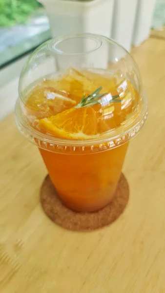 Orange Juice Mixed Punch Garnished Orange Pulp Rosemary Leaves — Foto Stock