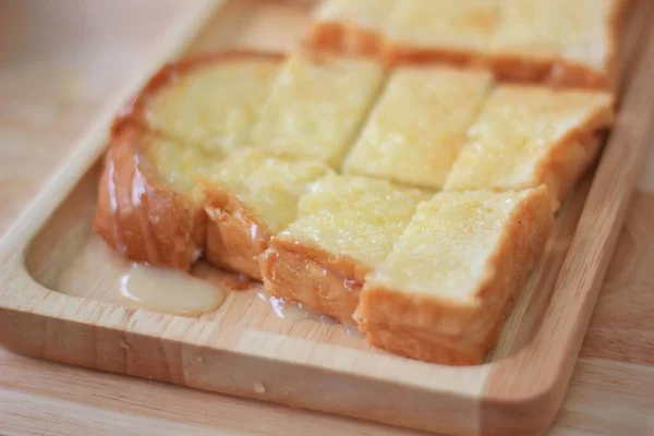 Toast Sweetened Condensed Milk Sprinkle Sugar Place Brown Wooden Tray — Stockfoto