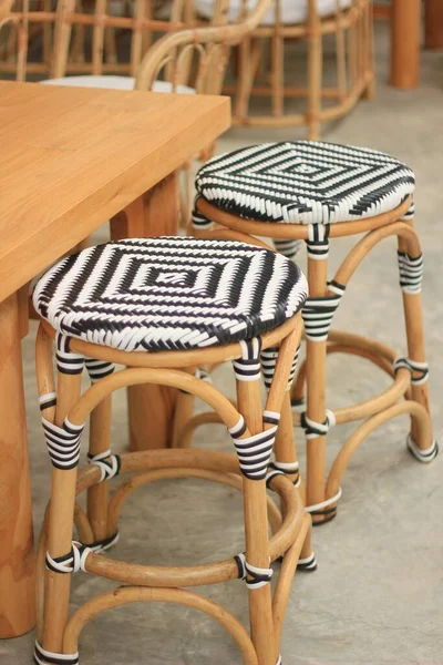Handmade products, textiles, chairs, made of black and white plastic. to be patterned wood made from rattan