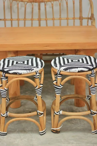 Handmade products, textiles, chairs, made of black and white plastic. to be patterned wood made from rattan