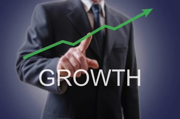 Üzletember, jelezve a növekedés — Stock Fotó