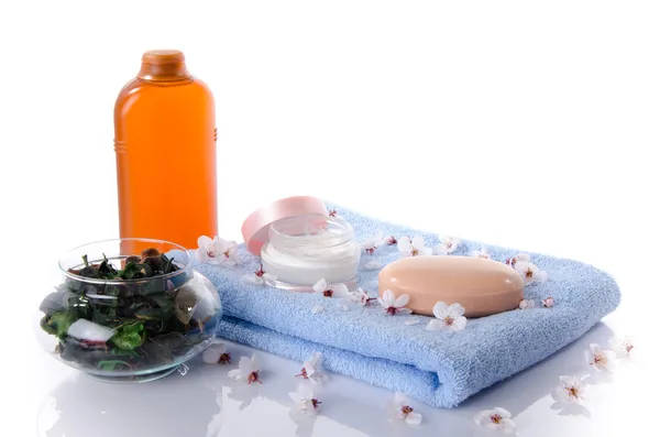 Soap and bath salt on a towel — Stock Photo, Image