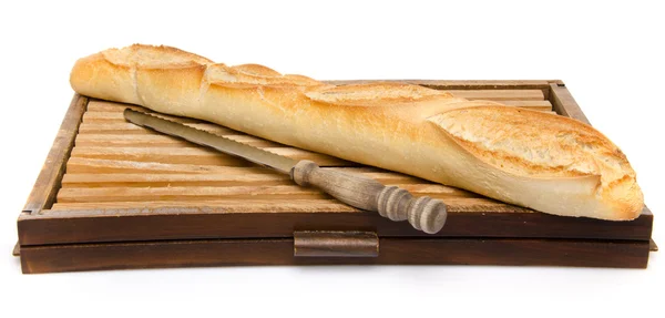 A baguette on a cutting board — Stock Photo, Image