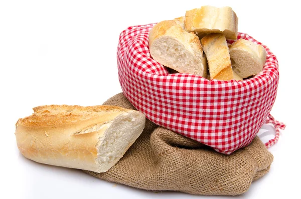Pieces of baguette in a bag — Stock Photo, Image