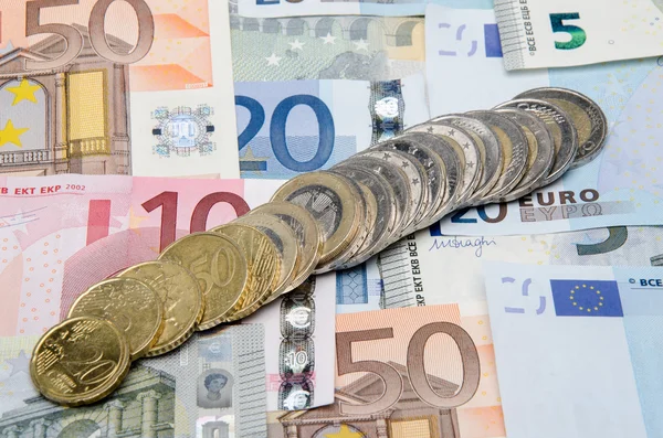 Banconote e monete in euro — Foto Stock