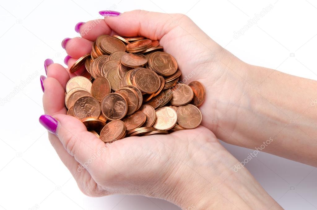 Hands full of copper coins