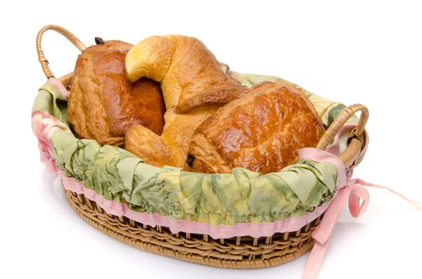 Some viennoiserie in a basket — Stock Photo, Image