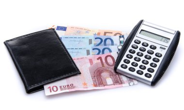 banknot, cüzdan ve bir hesap makinesi ile kompozisyon