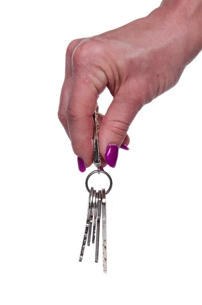 Mão de mulher segurando chaves — Fotografia de Stock