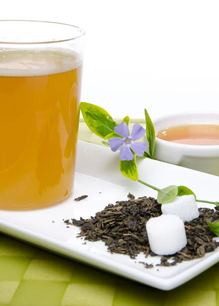 Cup of tea with honey and flowers — Stock Photo, Image