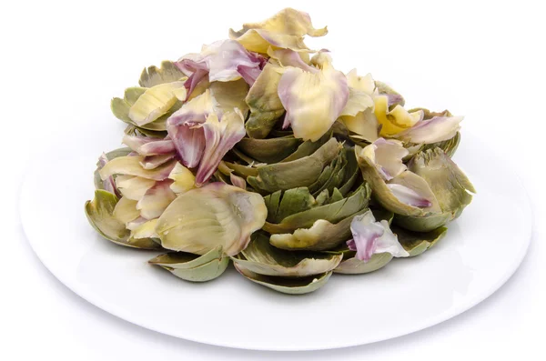 Artichoke leaves on a plate — Stock Photo, Image