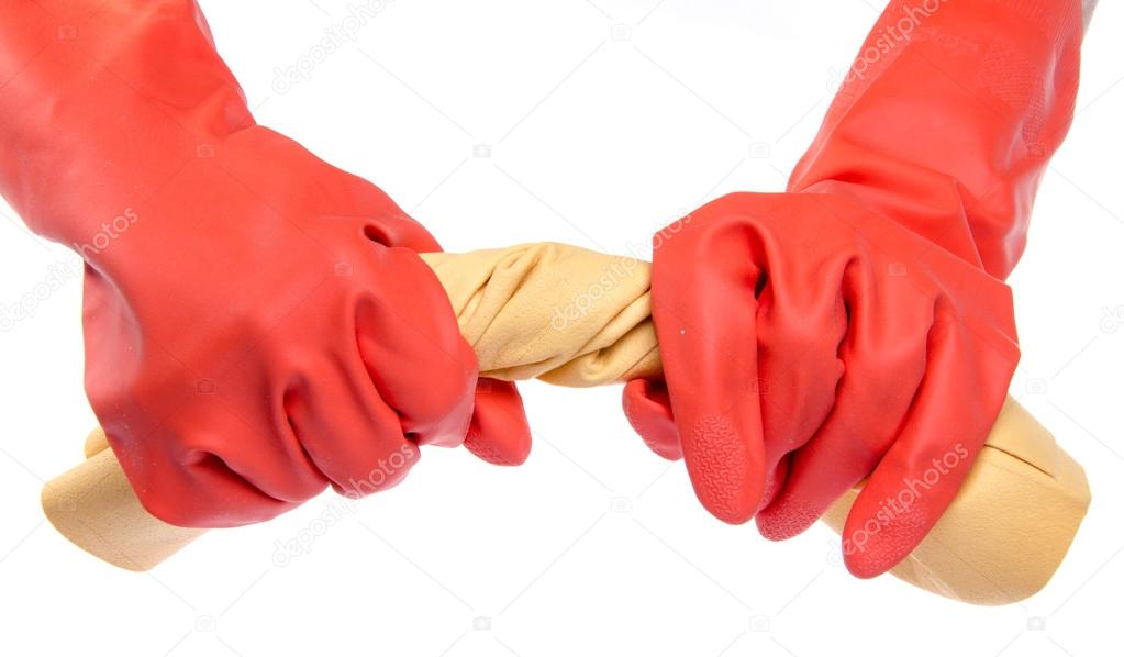 Hands in red rubber gloves wringing a cloth