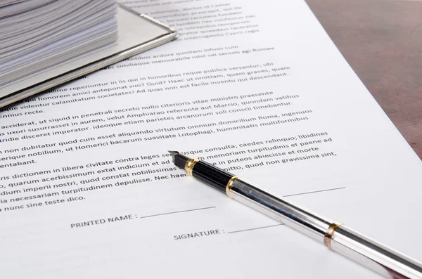 Pen on a paper to sign — Stock Photo, Image