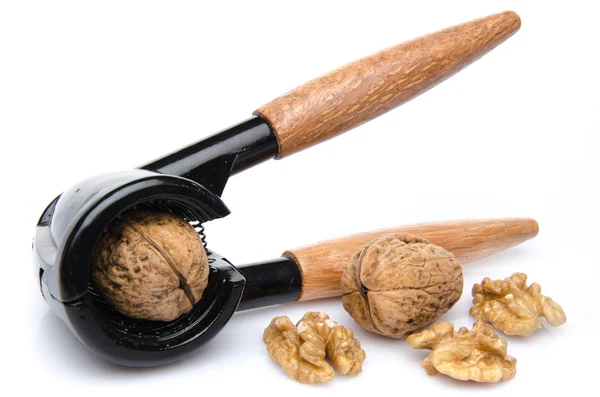 Walnut in een Notenkraker met walnoten — Stockfoto