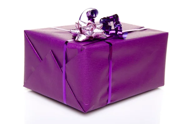 Purple gift box with a purple bow Royalty Free Stock Images