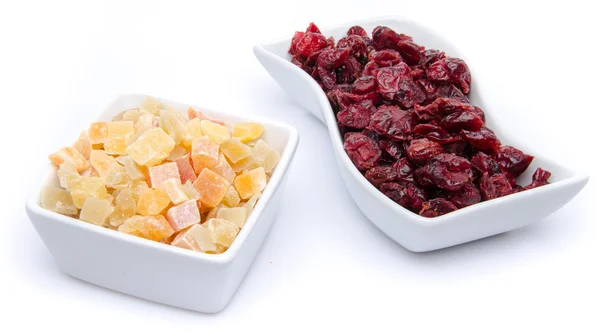 Dried cranberries and candied dried fruits in cups — Stock Photo, Image