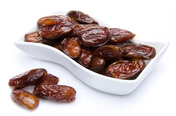 Dates in a cup Stock Picture