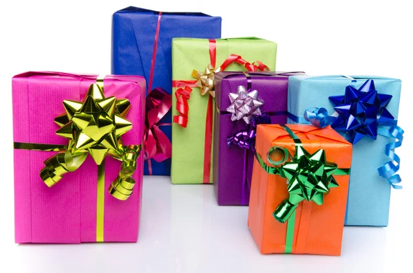 Colorful gift boxes with beautiful bows — Stock Photo, Image