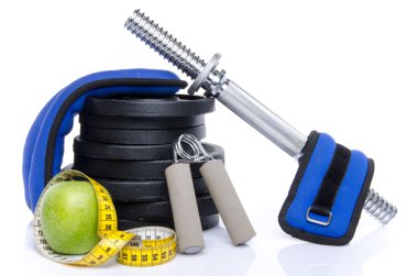 Sağlık kavramı, bir elma bir mezura ve fitness ekipmanları