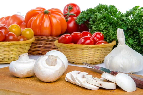 Composition with mushrooms, tomatoes, garlic and parsley — Stock Photo, Image