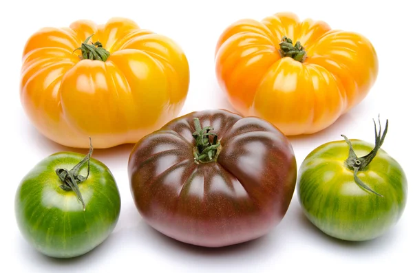 Tomates verdes, amarelos e roxos — Fotografia de Stock