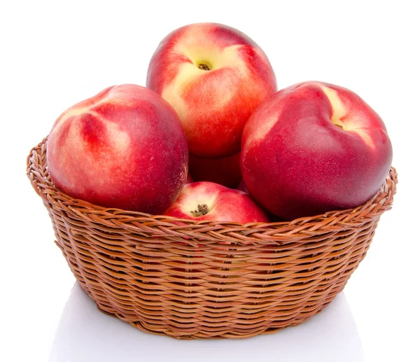 Nectarines in a basket — Stock Photo, Image