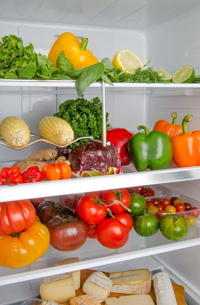 Different food products inside a refrigerator — Stock Photo, Image