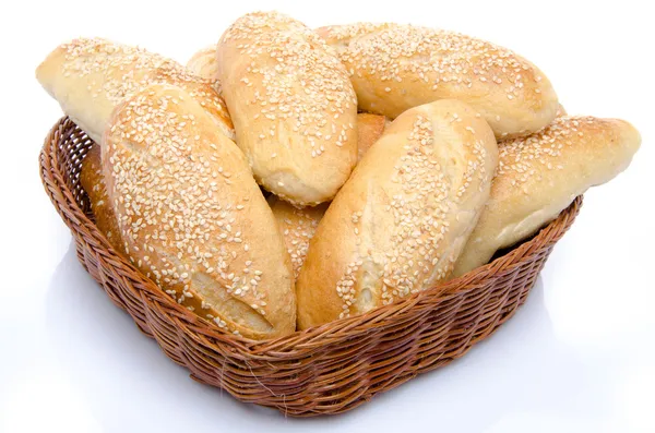 Small sesame breads in a basket — Stock Photo, Image