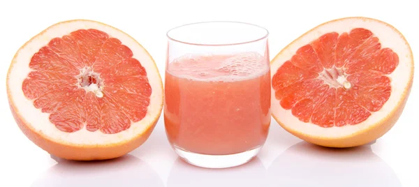 Glass of grapefruit juice with fresh grapefruit — Stock Photo, Image