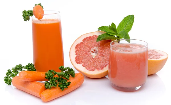 Composition with carrot and grapefruit juices — Stock Photo, Image