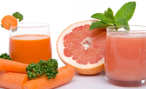 Composition with carrot and grapefruit juices — Stock Photo, Image